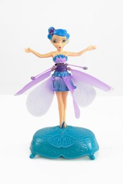 Musical Flying Fairy with Purple Wings